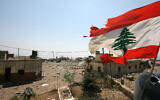 A Lebanese flag flies over Khiam prison, in the southern town of Khiam, Lebanon, August 16, 2006. (Nasser Nasser/AP)