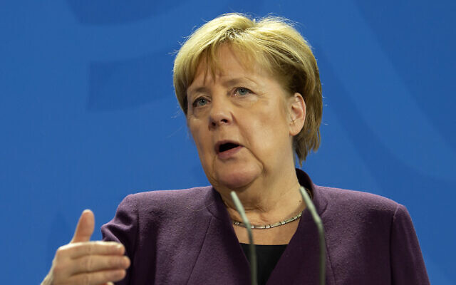 German Chancellor Angela Merkel gestures as she attends a press conference together with Austrian Chancellor Sebastian Kurz after a discussion in Berlin, Germany, Monday, February 3, 2020. (AP Photo/Jens Meyer) German Chancellor Angela Merkel gestures as she attends a press conference together with Austrian Chancellor Sebastian Kurz after a discussion in Berlin, Germany, Monday, February 3, 2020. (AP Photo/Jens Meyer)
