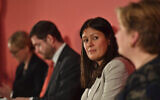 Candidates for leadership of Britain's Labour Party, with from right, Emily Thornberry, Lisa Nandy, Jim McMahon who is attending in place for candidate Kier Starmer, and Rebecca Long-Bailey, during the Labour leadership hustings in Nottingham, England, Saturday February 8, 2020. (Jacob King/PA via AP)