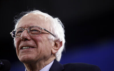Democratic presidential candidate Sen. Bernie Sanders, I-Vt., speaks to supporters at a primary night election rally in Manchester, New Hampshire on February 11, 2020. (AP Photo/Matt Rourke)