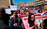 Women take part in a protest in Tahrir Square, Baghdad, Iraq, February 13, 2020. (AP Photo/Khalid Mohammed)