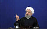 Then-Iranian president Hassan Rouhani gives a press conference in Tehran, Iran, February 16, 2020. (Ebrahim Noroozi/AP)