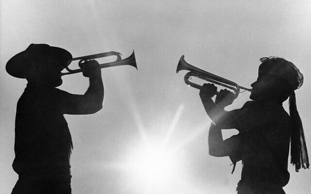 In this August 9, 1967, file photo, two boy scout members play the bugle at the 12th World Boy Scout Jamboree at Farragut State Park in Idaho (AP Photo/Jack Kanthal, File) In this August 9, 1967, file photo, two boy scout members play the bugle at the 12th World Boy Scout Jamboree at Farragut State Park in Idaho (AP Photo/Jack Kanthal, File)