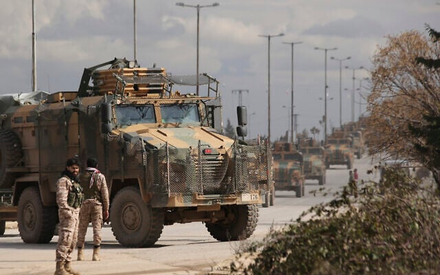 Turkish military convoy drives in Idlib province, Syria, Saturday, Feb. 22, 2020. (AP/Ghaith Alsayed) Turkish military convoy drives in Idlib province, Syria, Saturday, Feb. 22, 2020. (AP/Ghaith Alsayed)