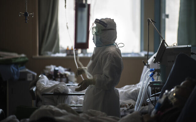In this Feb. 22, 2020, photo released by Xinhua News Agency, a nurse works at an ICU ward specialized for patients infected by coronavirus in Wuhan in central China's Hubei Province (Xiao Yijiu/Xinhua via AP) In this Feb. 22, 2020, photo released by Xinhua News Agency, a nurse works at an ICU ward specialized for patients infected by coronavirus in Wuhan in central China's Hubei Province (Xiao Yijiu/Xinhua via AP)