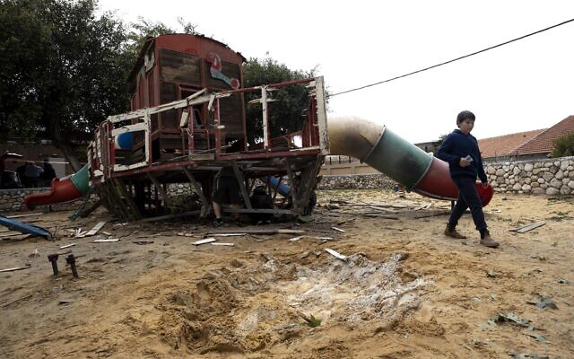 A boy walks inside a kindergarten's playground that was hit by a missile fired from the Gaza Strip in the city of Sderot, Israel, February 24, 2020. (AP Photo/Tsafrir Abayov) A boy walks inside a kindergarten's playground that was hit by a missile fired from the Gaza Strip in the city of Sderot, Israel, February 24, 2020. (AP Photo/Tsafrir Abayov)