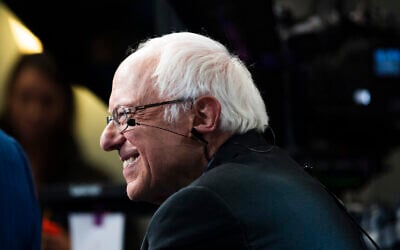 Democratic presidential candidate Sen. Bernie Sanders speaks with members of the media after a Democratic presidential primary debate, Feb. 25, 2020, in Charleston, S.C. (AP Photo/Matt Rourke)