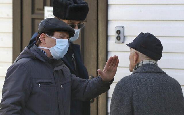 A security guard forbids access for visitors to the hospital for infectious diseases, in Minsk, Belarus, Feb. 28, 2020 (AP Photo/Sergei Grits) A security guard forbids access for visitors to the hospital for infectious diseases, in Minsk, Belarus, Feb. 28, 2020 (AP Photo/Sergei Grits)