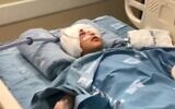 A 9-year-old who was shot in the head by a  a sponge-tipped bullet during a police operation in the East Jerusalem neighborhood of Issawiya in hospital in Jerusalem on February 26, 2020 (Screencapture/Channel 13)