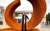 American sculptor Beverly Pepper with her creation during a private viewing of the 'Beverly Pepper At Ara Pacis' show at Ara Pacis Museum in Rome on Dec. 3, 2014. (Elisabetta A. Villa/Getty Images/JTA)