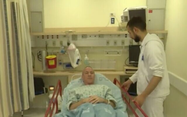 Screen capture from video of Blue and White MK Chili Tropper in hospital to donate a kidney, February 2, 2020. (Channel 12)