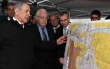 Prime Minister Benjamin Netanyahu (L) and US Ambassador to Israel David Friedman (2nd-L) at the northern West Bank settlement of Ariel on February 24, 2020. (David Azagury/US Embassy Jerusalem)