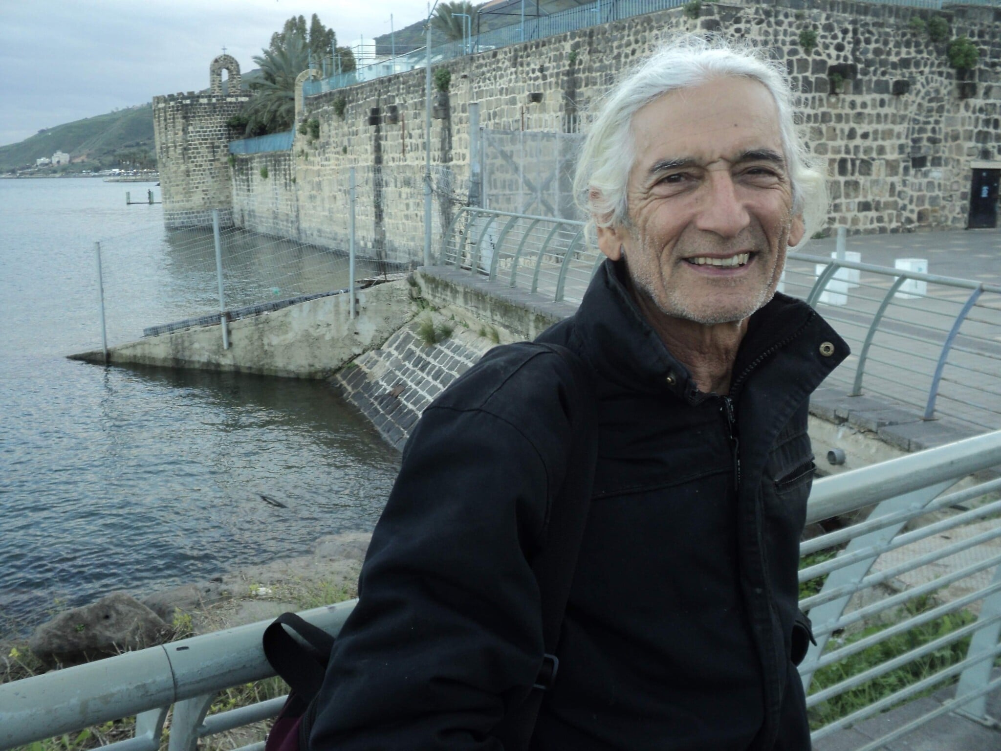 Rami Ben-Tzvi in Tiberias, Israel, with the jetty of his rowing club in the background, on February 9, 2020. (Nathan Jeffay/Times of Israel) Rami Ben-Tzvi in Tiberias, Israel, with the jetty of his rowing club in the background, on February 9, 2020. (Nathan Jeffay/Times of Israel)