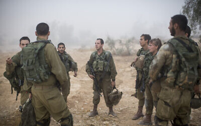 Illustrative. Soldiers of the Bardales Battalion listen to their commander during a training exercise in southern Israel, on July 13, 2016. (Hadas Parush/Flash90)