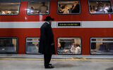 Passengers at Yitzhak Navon train station in Jerusalem. (Yonatan Sindel/Flash90)