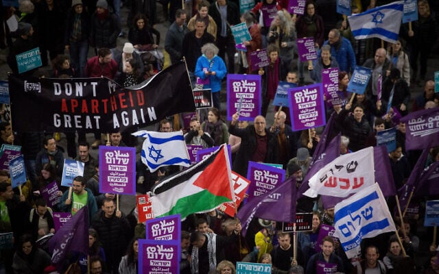 Left-wing activists demonstrate against the US peace plan in Tel Aviv on February 1, 2020. (Miriam Alster/Flash90) Left-wing activists demonstrate against the US peace plan in Tel Aviv on February 1, 2020. (Miriam Alster/Flash90)