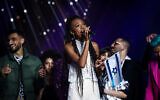 Eden Alene, Israel's 2021 Eurovision representative and winner of the reality show 'The Next Star,' during the final in Neve Ilan studio near Jerusalem on February 4, 2020. (Shlomi Cohen/Flash90)