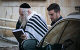 Eliezer Berland arrives for a court hearing at the Magistrate's Court in Jerusalem, on February 9, 2020. (Yonatan Sindel/Flash90 )