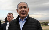Prime Minister Benjamin Netanyahu at a tree planting event for the Jewish holiday of Tu Bishvat in the West Bank settlement of Mevo'ot Yericho, in the Jordan Valley, February 10, 2020. (Flash90)