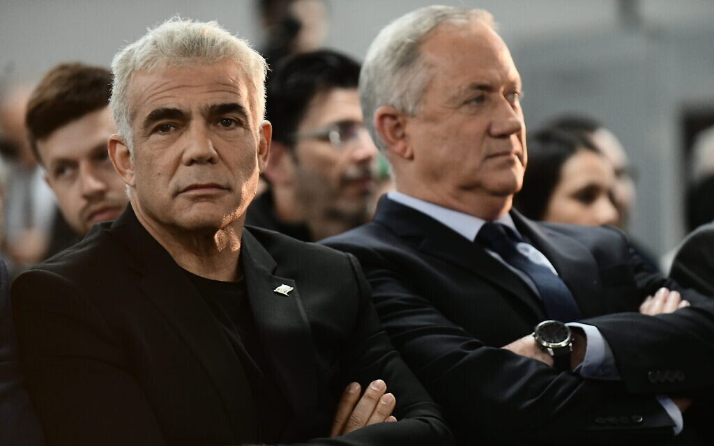 Yair Lapid (left) and Benny Gantz speak to supporters in Tel Aviv, on February 20, 2020. (Tomer Neuberg/Flash90) Yair Lapid (left) and Benny Gantz speak to supporters in Tel Aviv, on February 20, 2020. (Tomer Neuberg/Flash90)