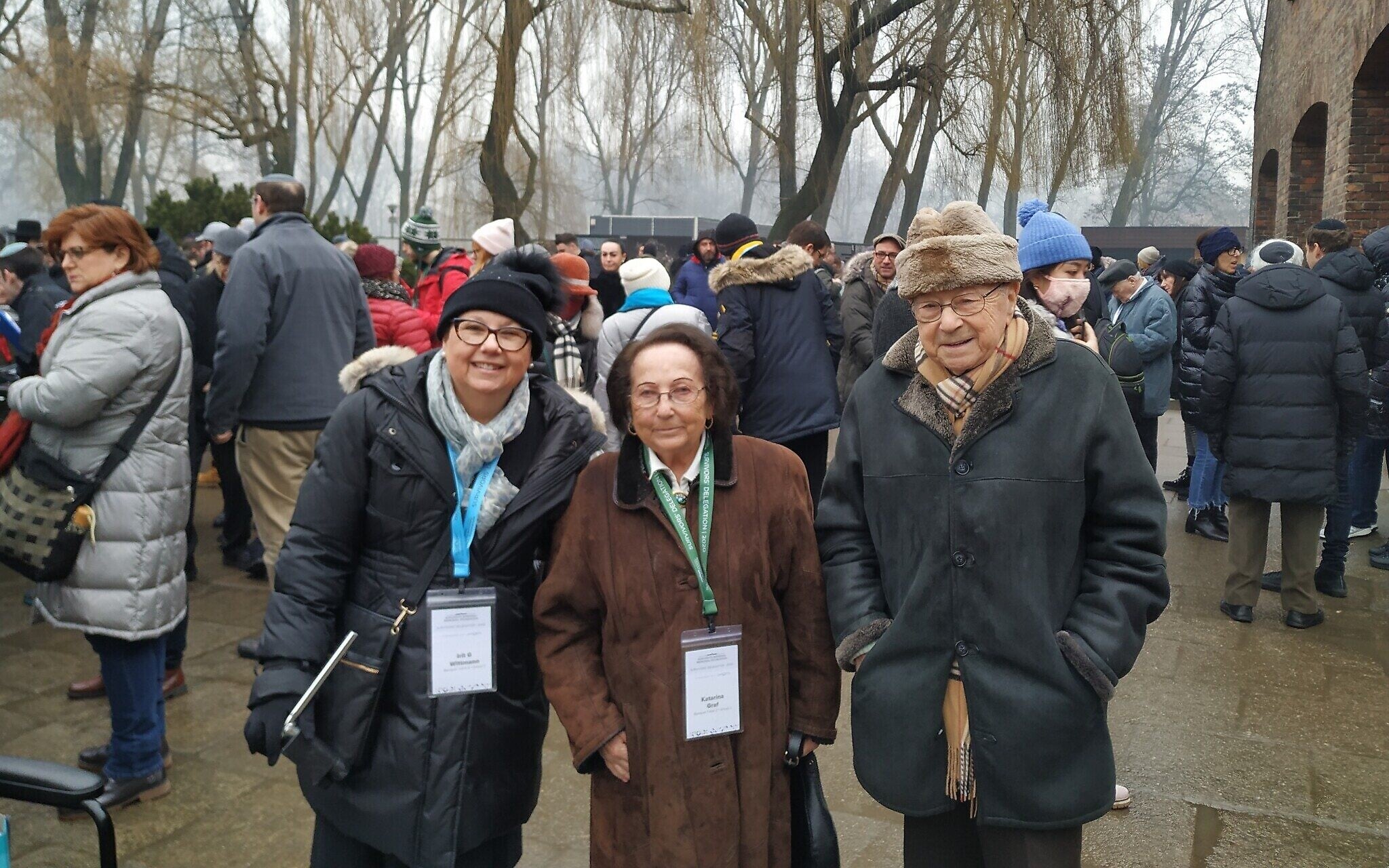 From left: Irit Wittmann, Katarina Graf, and Sol Graf pose in front of the Auschwitz-Birkenau Memorial and Museum, January 28, 2020. (Yaakov Schwartz/ Times of Israel) From left: Irit Wittmann, Katarina Graf, and Sol Graf pose in front of the Auschwitz-Birkenau Memorial and Museum, January 28, 2020. (Yaakov Schwartz/ Times of Israel)