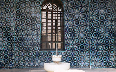 Tiles designed by Armenian artisan David Ohanessian decorate a fountain in East Jerusalem's Rockefeller Museum. (Shmuel Bar-Am)
