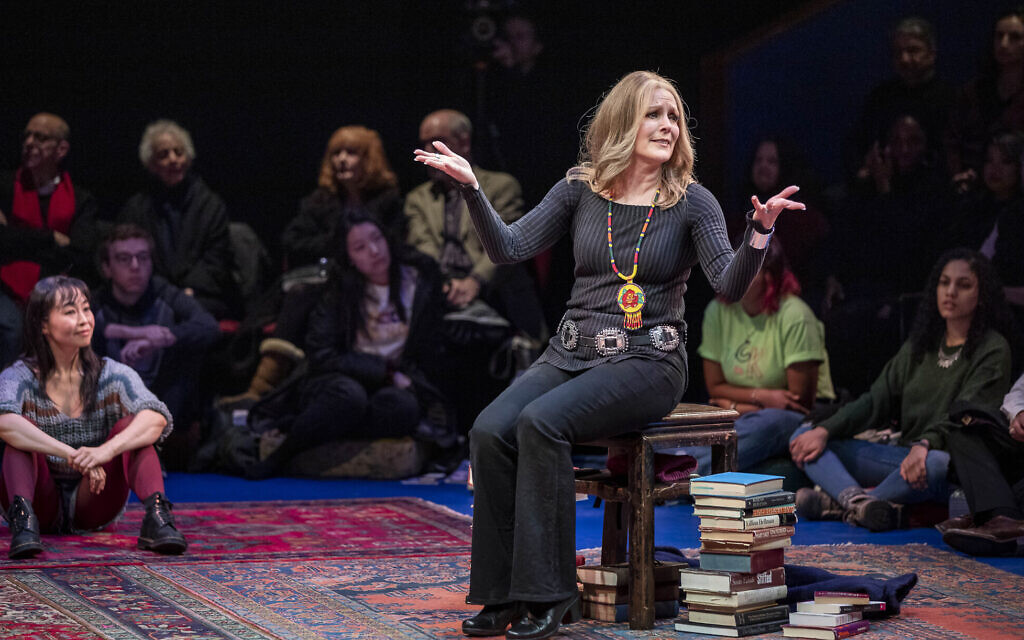 Patricia Kalember as Gloria Steinem, with Eunice Wong from the ensemble in 'Gloria: A Life.' (APrioriPhotography/ courtesy American Repertory Theater)