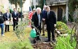 US Ambassador to Israel David Friedman (L) and KKL-JNF head Daniel Atar plant a tree for Tu B'Shvat at the US ambassador's residence in Jerusalem, February 12, 2020. (Rafi Ben Hakoon/KKL-JNF)