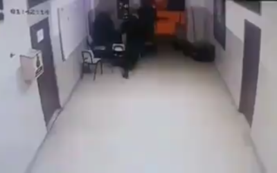 Security camera footage captures the moment after a Palestinian police officer is apparently shot by Israeli gunfire in the West Bank city of Jenin on February 6, 2020. (Screen capture)