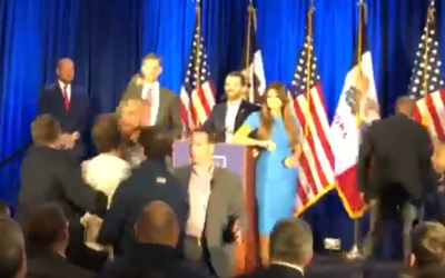 An activist from IfNotNow yells at Donald Trump Jr. during a campaign event in Des Moines, Iowa, February 3, 2020. (Screen capture: Twitter)1