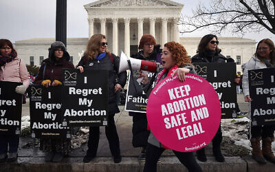 Protesters on both sides of the abortion issue gather in front of the U.S. Supreme Court building during the Right To Life March, on January 18, 2019 in Washington, DC. (Mark Wilson/Getty Images via JTA)