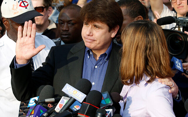 Former Illinois Gov. Rod Blagojevich, with his wife Patti at his side, speaks to the media in Chicago before reporting to federal prison in Denver, March 14, 2012. (AP Photo/M. Spencer Green, File) Former Illinois Gov. Rod Blagojevich, with his wife Patti at his side, speaks to the media in Chicago before reporting to federal prison in Denver, March 14, 2012. (AP Photo/M. Spencer Green, File)