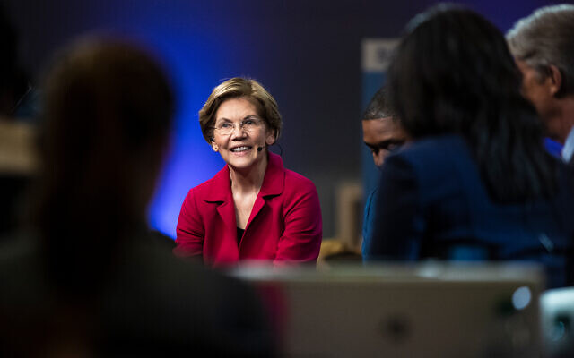 Democratic presidential candidate Sen. Elizabeth Warren speaks with members of the media after a Democratic presidential primary debate, Feb. 25, 2020, in Charleston, South Carolina. (AP Photo/Matt Rourke) Democratic presidential candidate Sen. Elizabeth Warren speaks with members of the media after a Democratic presidential primary debate, Feb. 25, 2020, in Charleston, South Carolina. (AP Photo/Matt Rourke)