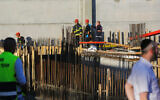 Illustrative: Rescue and medical teams at the scene at a construction site in Kiryat Gat where a worker died in a working accident, December 29, 2019. (Flash90)