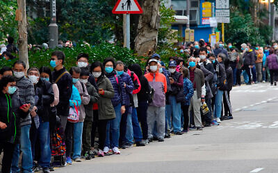 People line up to buy face masks in Hong Kong amid coronavirus fears, Feb. 5, 2020. (AP/Vincent Yu, File)