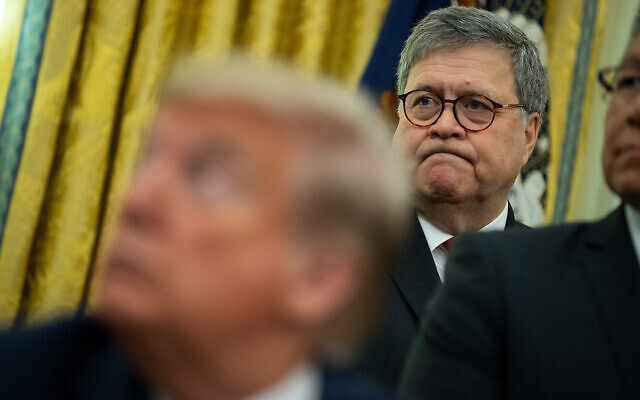 US Attorney General William Barr listens as President Donald Trump speaks at the White House, November 26, 2019, in Washington. (AP Photo/ Evan Vucci) US Attorney General William Barr listens as President Donald Trump speaks at the White House, November 26, 2019, in Washington. (AP Photo/ Evan Vucci)