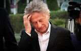 French-Polish director Roman Polanski stands on the red carpet of the 45th Deauville US Film Festival, in Deauville, northern France, September 7, 2019. (Lou Benoist/AFP)