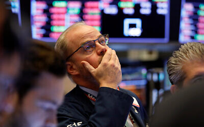 Trader David O'Day works on the floor of the New York Stock Exchange as equities plummet due to the coronavirus outbreak, Feb. 28, 2020. (AP/Richard Drew)