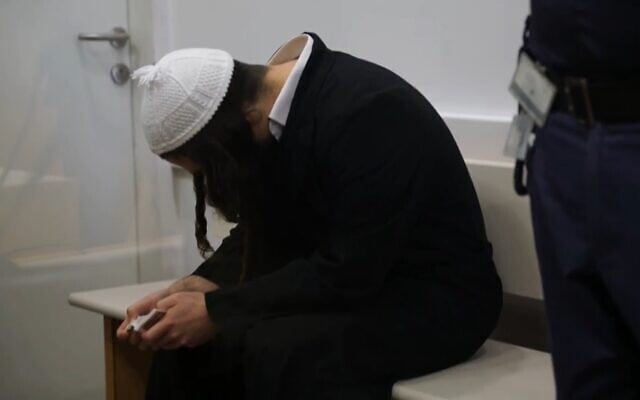 Duma terror attack suspect Amiram Ben-Uliel sits in the Lod District Court on June 26, 2019. (Screen capture/YouTube) Duma terror attack suspect Amiram Ben-Uliel sits in the Lod District Court on June 26, 2019. (Screen capture/YouTube)