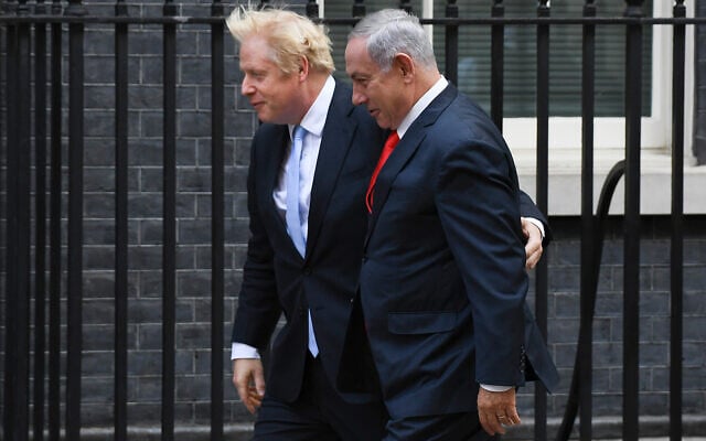 Britain's Prime Minister Boris Johnson greets then-prime minister Benjamin Netanyahu at Downing Street, in London, September 5, 2019. (AP Photo/Alberto Pezzali) Britain's Prime Minister Boris Johnson greets then-prime minister Benjamin Netanyahu at Downing Street, in London, September 5, 2019. (AP Photo/Alberto Pezzali)