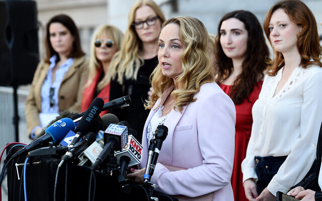 Actress Louisette Geiss addresses the media at a news conference by the "Silence Breakers," a group of women who have spoken out about Hollywood producer Harvey Weinstein's sexual misconduct, at Los Angeles City Hall, Feb. 25, 2020. (AP Photo/Chris Pizzello) Actress Louisette Geiss addresses the media at a news conference by the "Silence Breakers," a group of women who have spoken out about Hollywood producer Harvey Weinstein's sexual misconduct, at Los Angeles City Hall, Feb. 25, 2020. (AP Photo/Chris Pizzello)