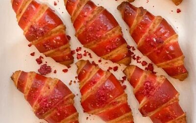 The 'roselach' at Breads Bakery are made with marzipan, rose water, and sprinkled with raspberry. (courtesy Breads Bakery)
