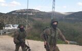 Israeli troops search for a gunman who opened fire at an IDF soldier, lightly injuring him, near the central West Bank settlement of Dolev on February 6, 2020. (Israel Defense Forces)
