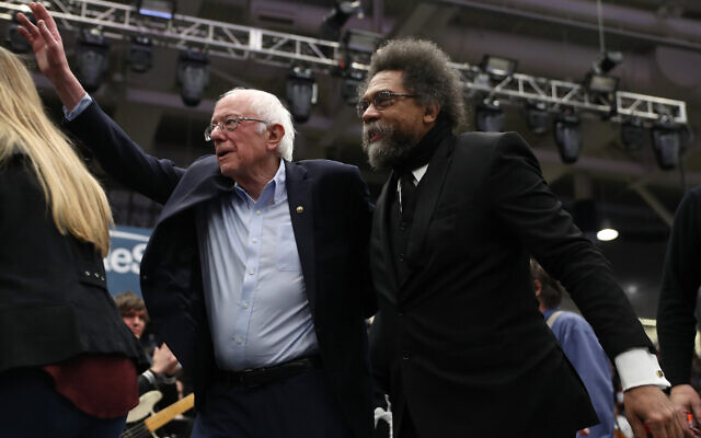 Bernie Sanders and Cornel West walk onstage together during a campaign event at the Whittemore Center Arena in Durham, New Hampshire, February 10, 2020. (Joe Raedle/Getty Images via JTA) Bernie Sanders and Cornel West walk onstage together during a campaign event at the Whittemore Center Arena in Durham, New Hampshire, February 10, 2020. (Joe Raedle/Getty Images via JTA)
