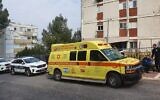 Emergency services outside a building in Afula where a mother and daughter were found dead, February 18, 2020. (Magen David Adom)