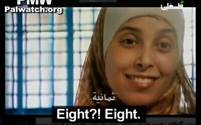 Ahlam Tamimi reacts when told that eight children were killed in the 2001 Sbarro bombing she orchestrated (Screenshot)