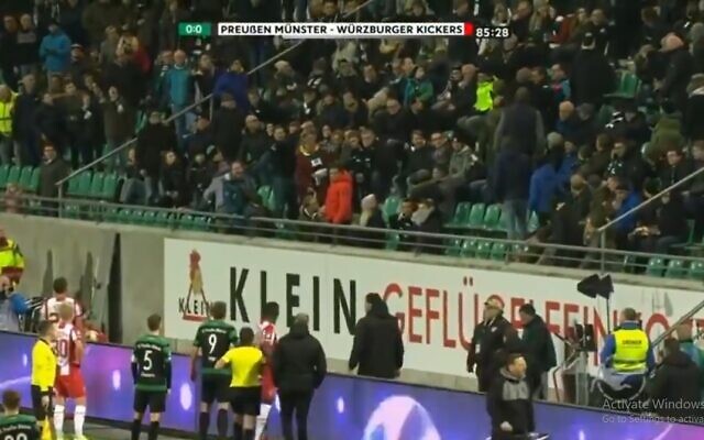 Fans of German soccer club Preußen Münster get man removed from stadium for racist abuse, February 14, 2020 (Screen grab/Twitter) Fans of German soccer club Preußen Münster get man removed from stadium for racist abuse, February 14, 2020 (Screen grab/Twitter)