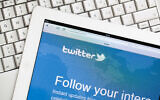 iPad with Twitter website open. (wundervisuals via iStockPhoto)