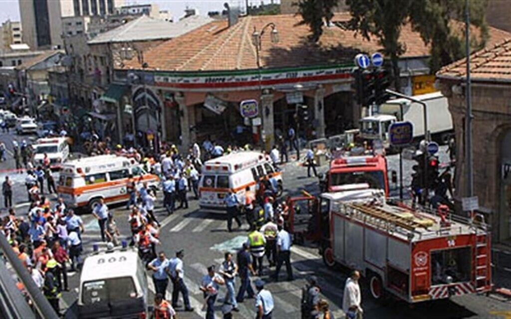 Emergency services at the scene of a suicide bombing inside Jerusalem's Sbarro restaurant, Thursday, August 9, 2001. Sixteen people were killed, and 130 injured. (Courtesy) Emergency services at the scene of a suicide bombing inside Jerusalem's Sbarro restaurant, Thursday, August 9, 2001. Sixteen people were killed, and 130 injured. (Courtesy)
