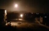 Illustrative: Explosions are seen in the skies over Damascus as the Syrian military fires anti-aircraft weapons at incoming missiles during an attack attributed to Israel on February 6, 2020. (SANA)